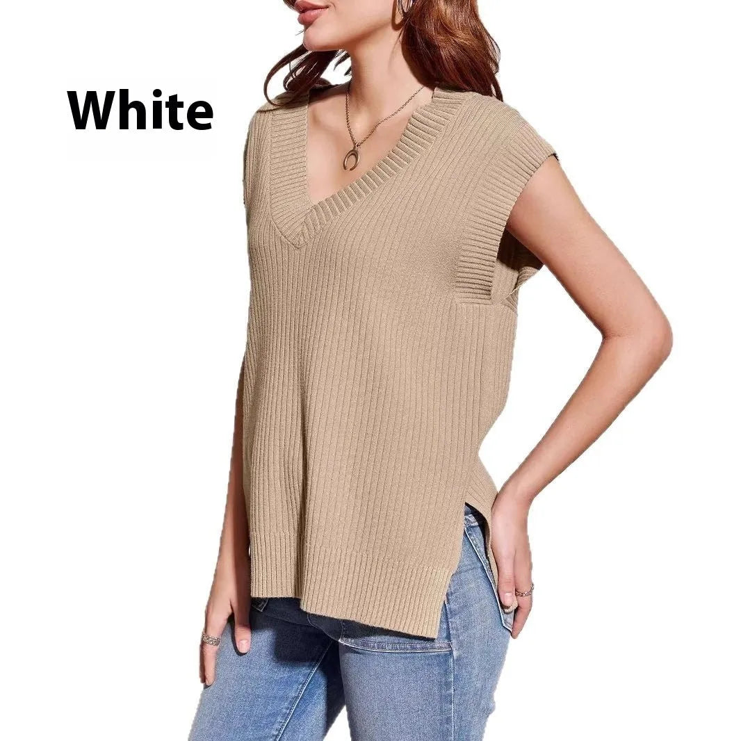 Camel coloured loose v-neck sleeveless vest with a striped pattern on a hanger.