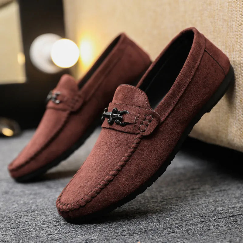 Men's black waterproof slip-on loafers with round toe and low stiletto heel on a rubber sole