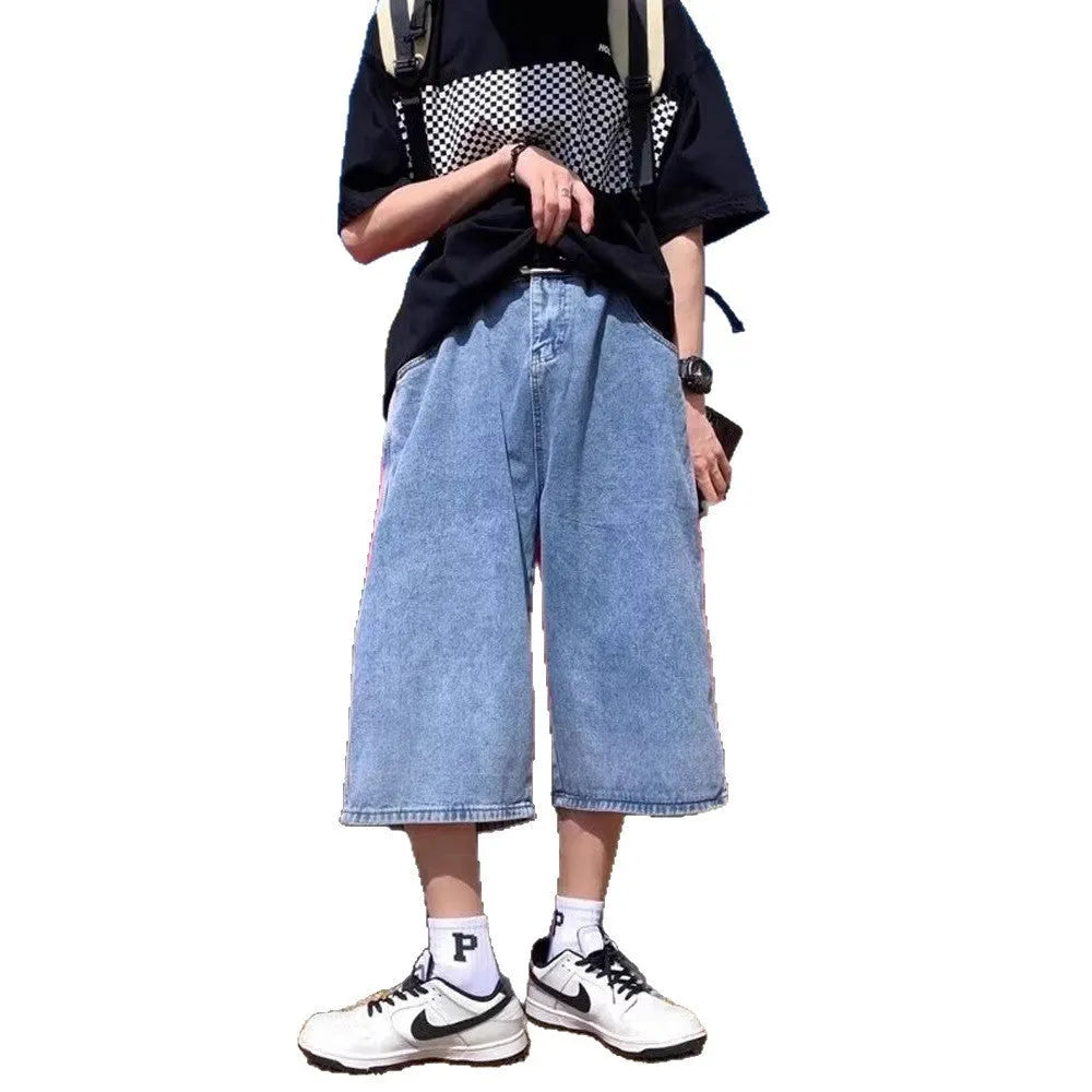 Men's blue washed denim shorts with high waist, cropped length, straight leg, and zipper fly