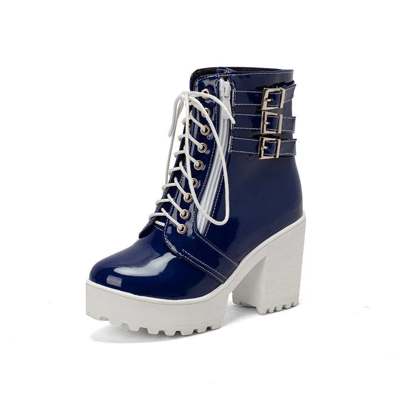 Women's black chunky heel ankle boots with round toe and front lace-up on a waterproof platform sole.