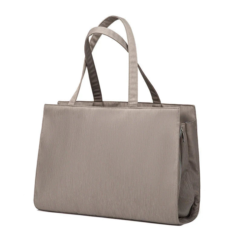 Versatile Folding Mother and Baby Diaper Bag with large capacity, foldable design, and multiple compartments for organizing baby essentials