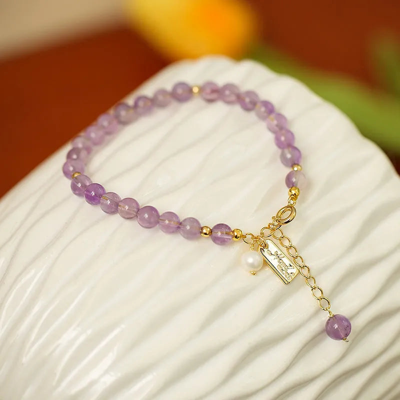 Women's natural crystal bracelet with lavender amethyst stones in dark and light colour options