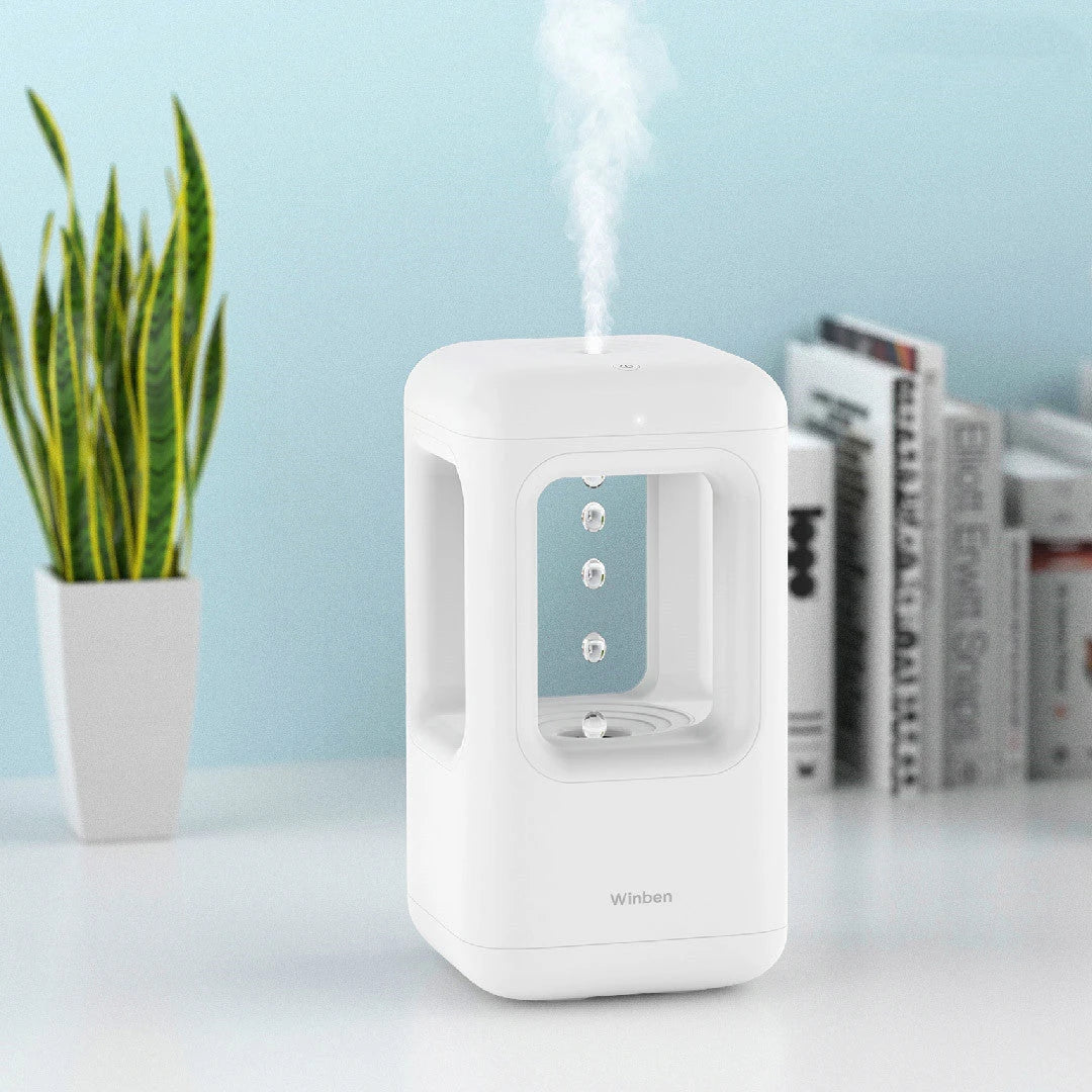 Quiet cool mist humidifier with anti-gravity water droplets, ideal for bedrooms and home decor