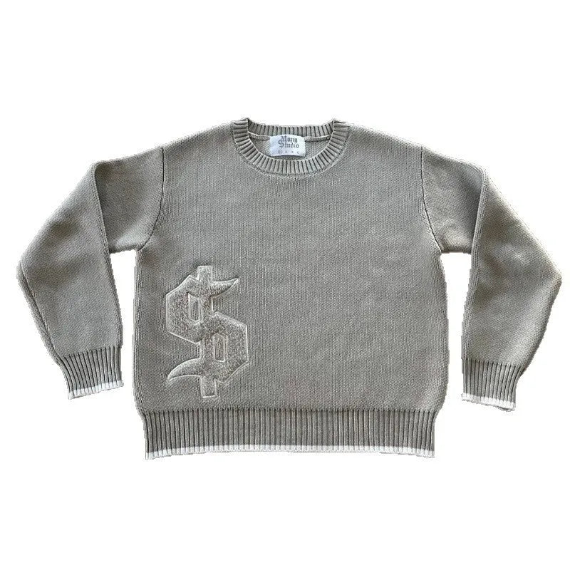 Grey loose-fitting jacquard knit coat with long sleeves on a hanger