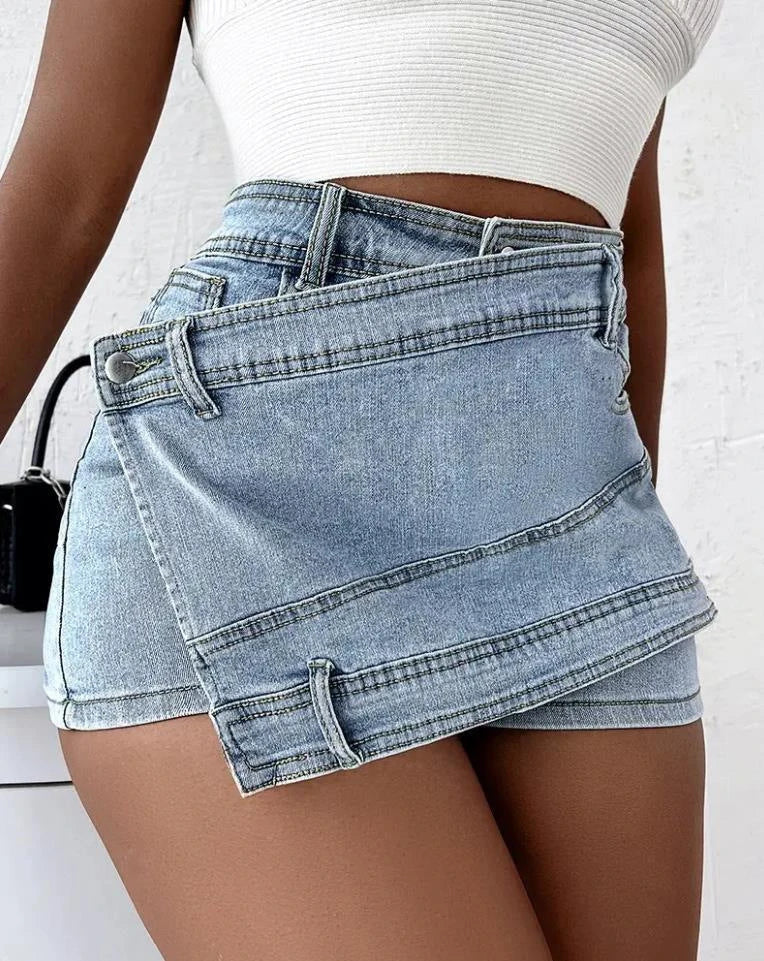 Stylish Y2K-inspired denim shorts with an asymmetrical hemline, high-waist design, and stretch fabric for a flattering fit