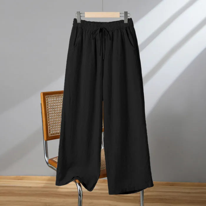 Women's straight-leg casual trousers with elastic waistband and drawstring closure in polyester fabric