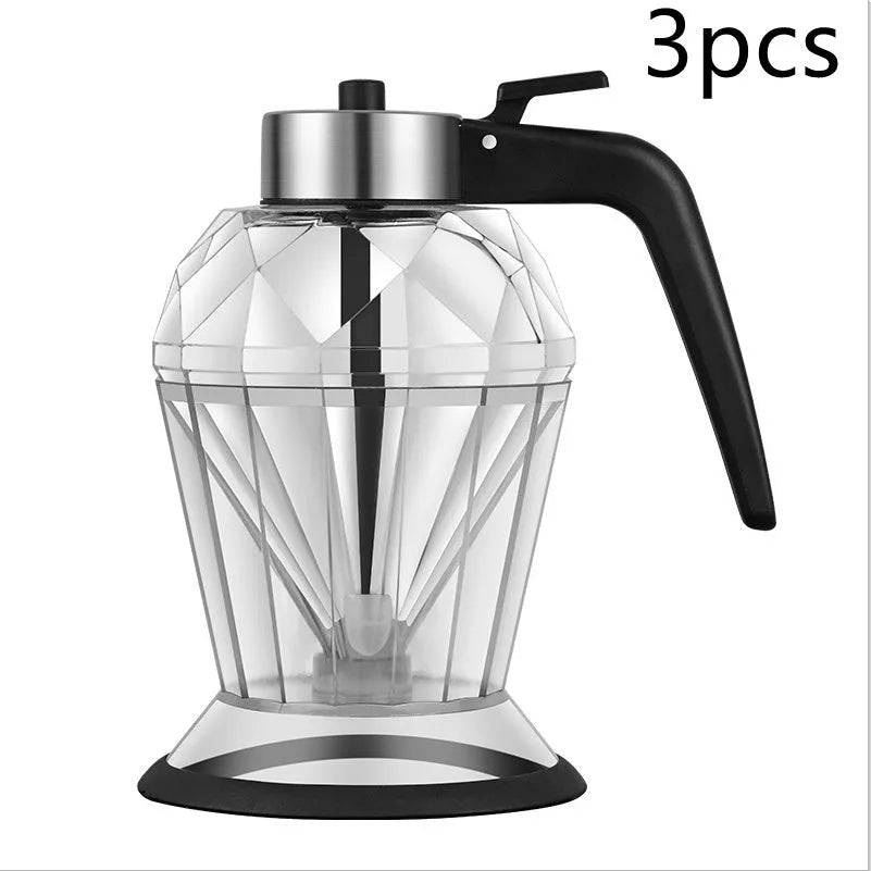 Diamond-shaped glass oil jug with press-type dispenser for drip-free pouring