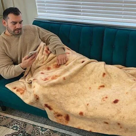 Cozy, soft, and versatile flannel burrito blanket in a unique round shape with a playful, delicious-looking design