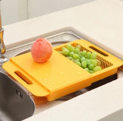 Multifunctional cutting board with integrated strainer and storage tray, made of durable PP material with flexible, rake-shaped body for comfortable chopping