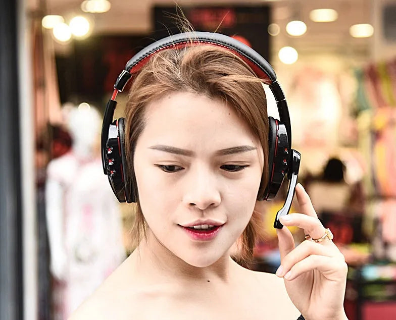 Black wireless Bluetooth headset with 40mm speakers, 300mAh battery, and up to 10m range