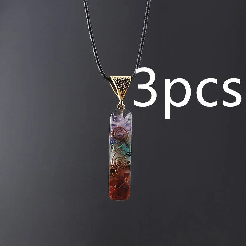 A stylish 7-chakra crystal pendant featuring a unique geometric design and natural stone patterns