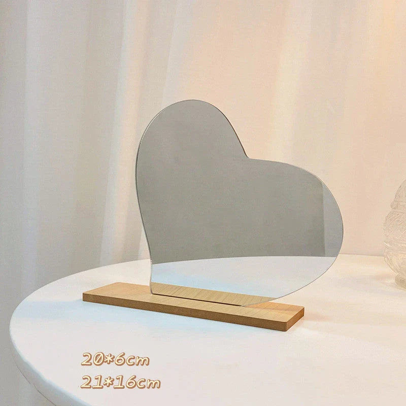 Acrylic makeup mirror with irregular edge and wooden base, available in various decorative styles