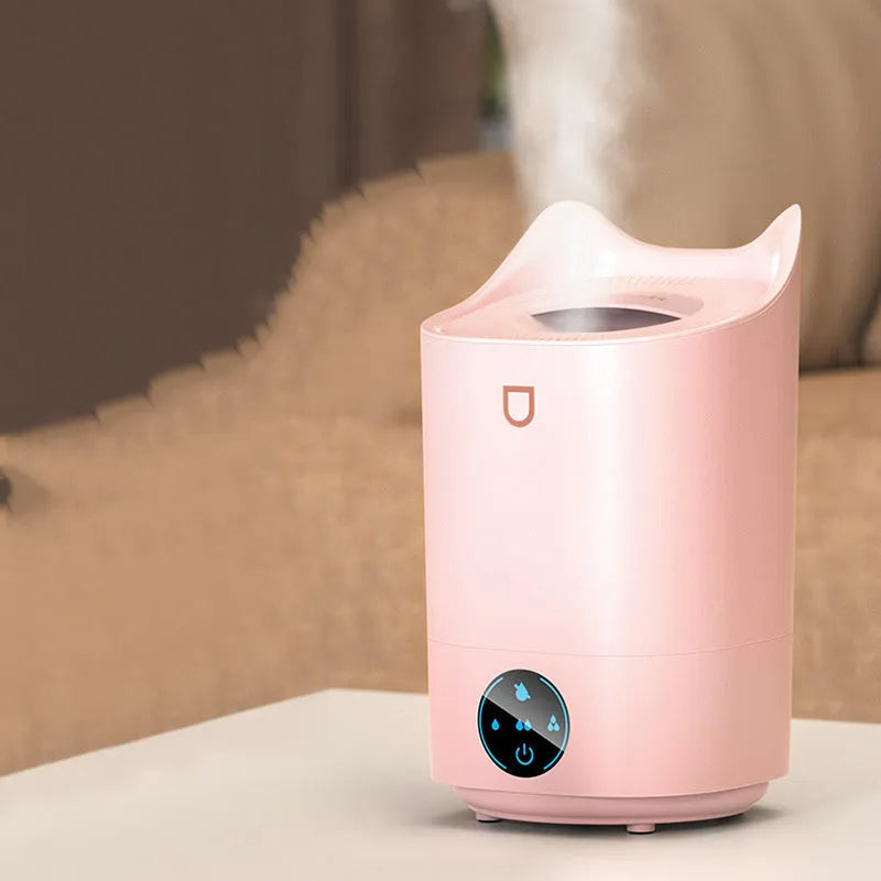 Double spray humidifier in Coral Pink or Glacier White with USB cable and three mist outlets