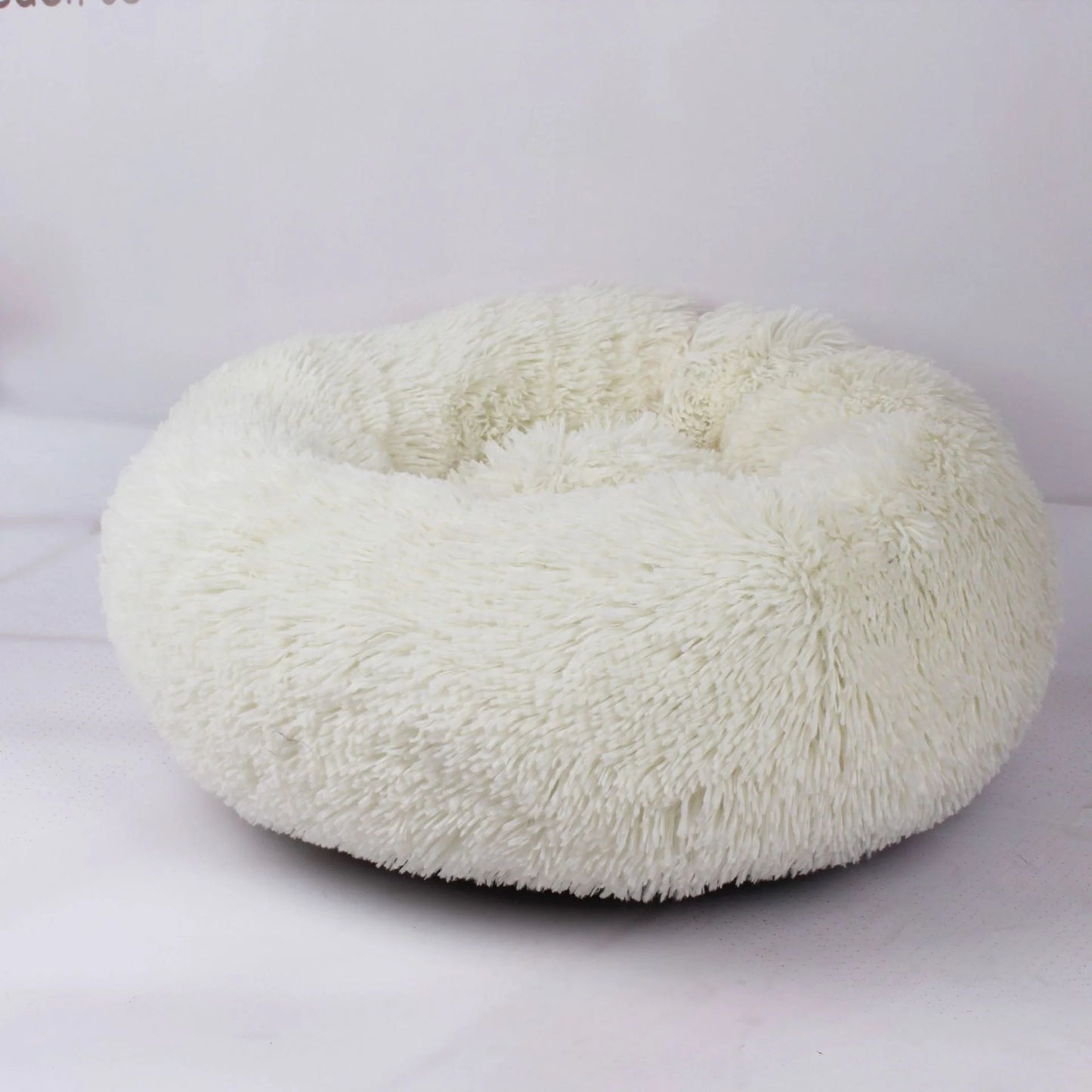 Cozy plush pet nest in various colors and sizes for ultimate pet comfort