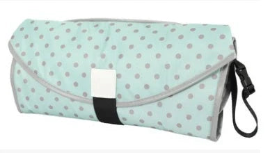 Portable and Waterproof Baby Changing Pad in various color designs, featuring a compact folded size and generous expanded size for comfortable diaper changes