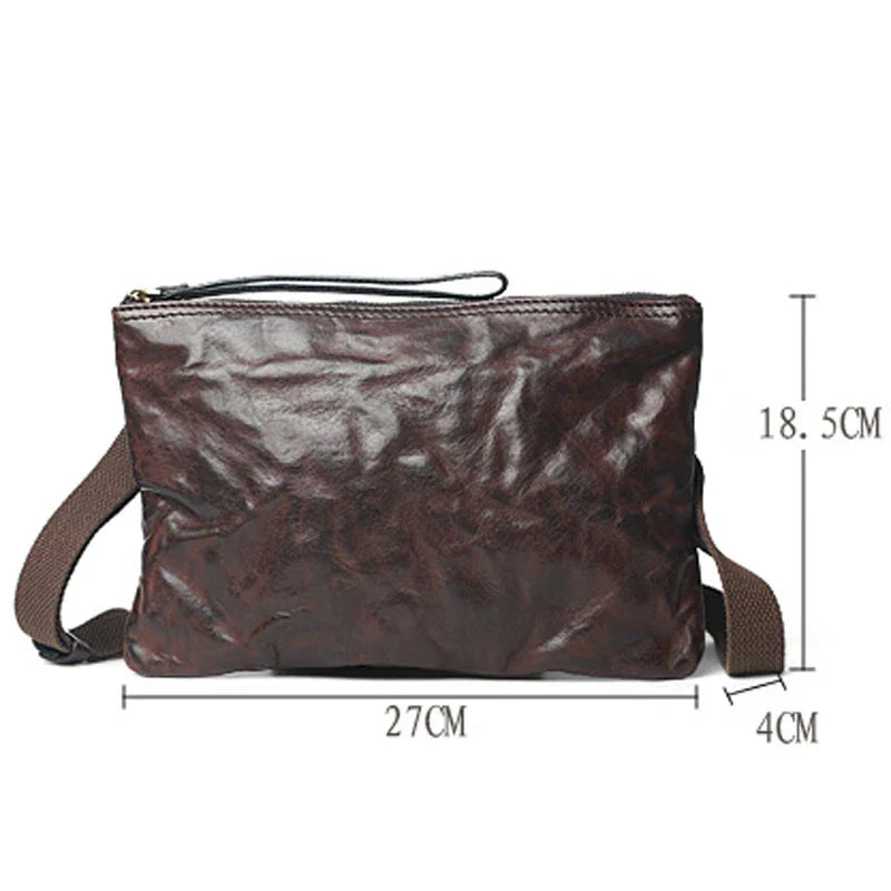 Handmade vintage-inspired leather crossbody bag with ruffled design and zipper closure