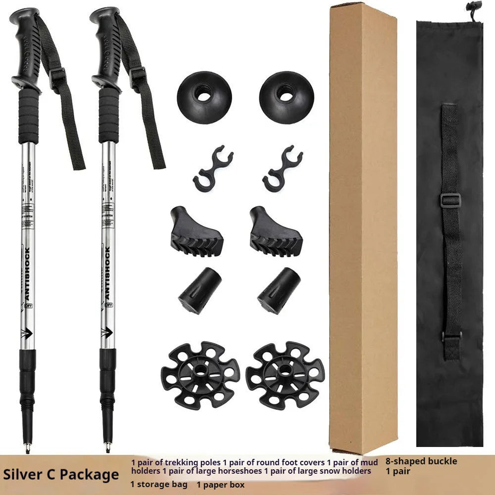 Aluminium alloy telescopic trekking pole extended with straight handle, shown with accessory tips including foot cover and snow holder.