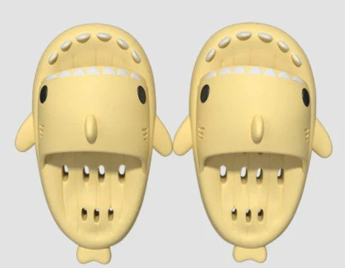 Colorful shark-themed shower slides with drainage holes, designed for comfortable and practical use in the pool or shower.