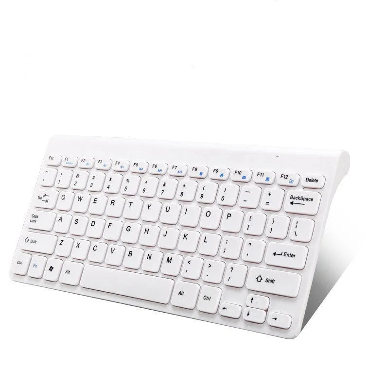 Black and white wireless keyboard and mouse set on a desk with 4G dongle