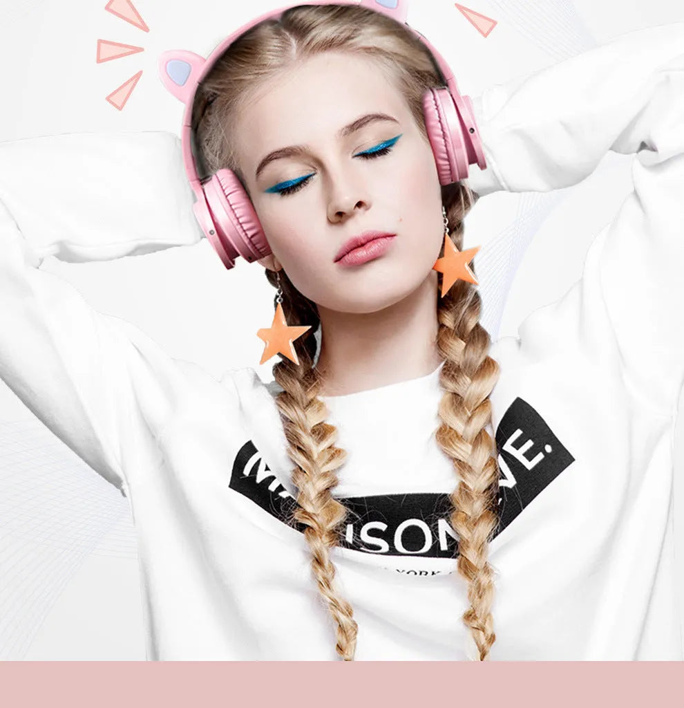 Pink and white wireless Bluetooth headset with 40mm speakers and braided cable