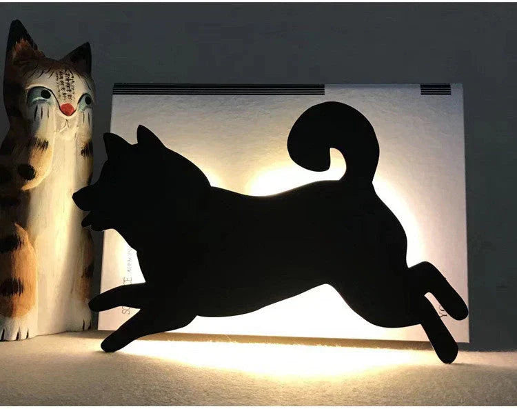 Illuminating pet-themed night light with smart sound sensor and customizable design