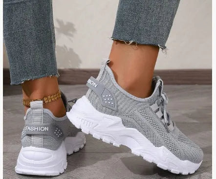 Women's Flyknit mesh casual sports shoes in multiple colours showing flat heel and lace-up design