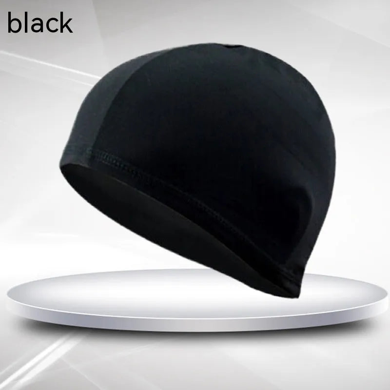 Unisex solid black polyester swim cap for adults on a white background.