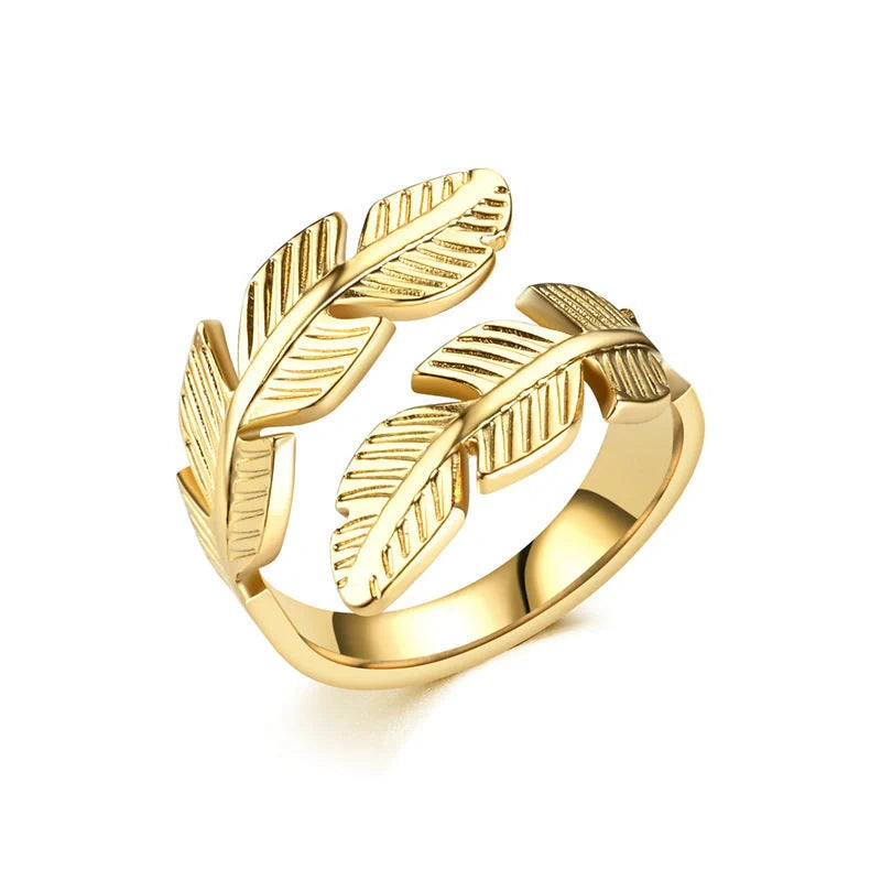 Adjustable feather ring in titanium steel with gold and silver options, featuring a unique handcrafted design.