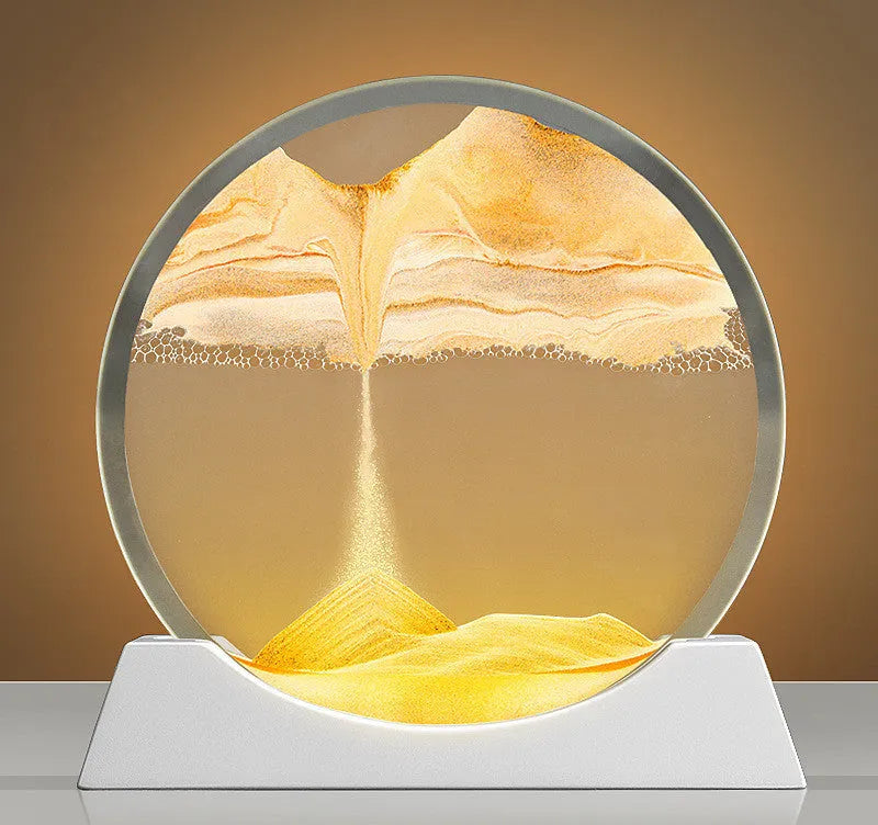 A rotary abstract night lamp with coloured sand falling inside clear glass, showing blue variant.