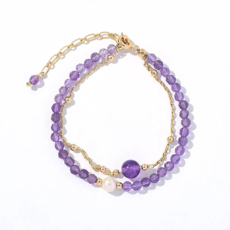 Amethyst colour crystal women's bracelet with diamond cut shapes and Chinese style design