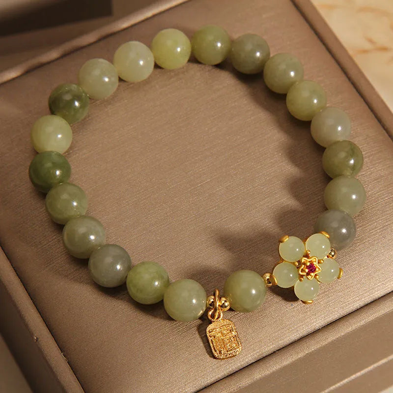 Women's casual bracelet with a grey jade stone set in an alloy metal band.