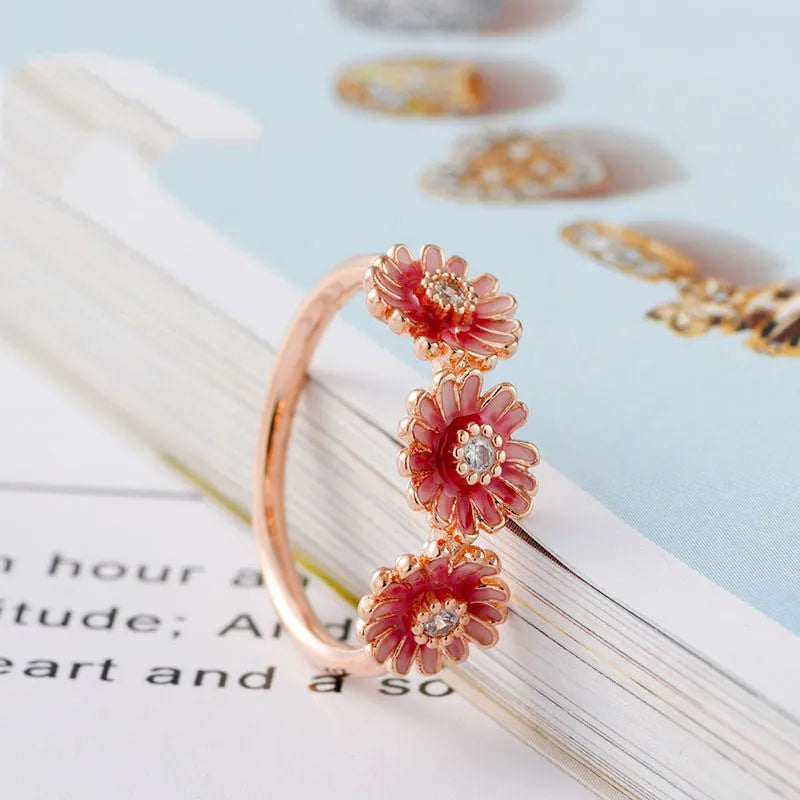 Pink daisy ring in 925 sterling silver with micro-inlay gemstones, five sizes 50mm to 58mm.