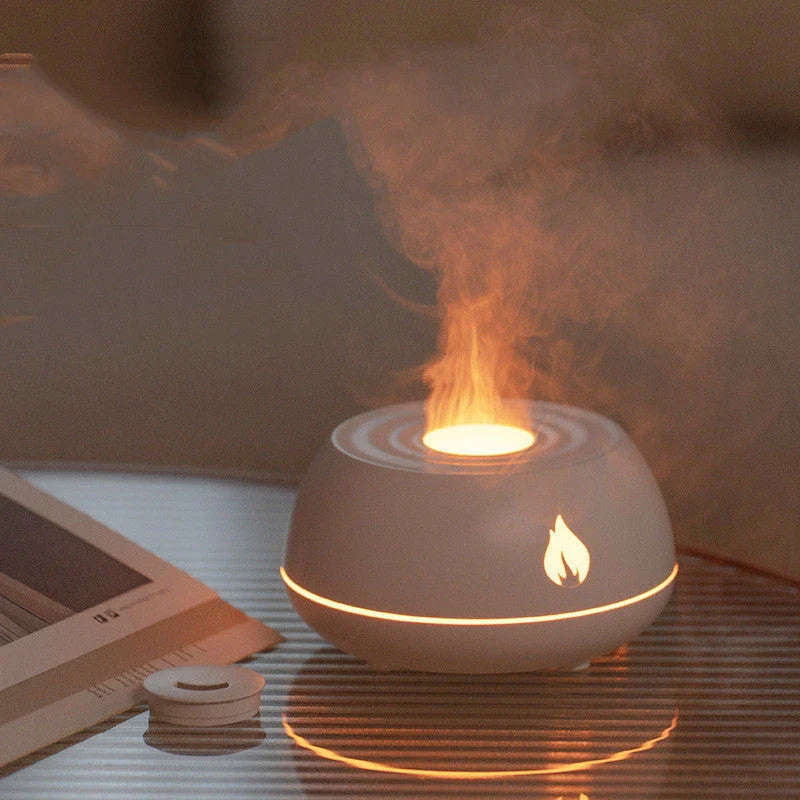 Aromatherapy diffuser with realistic flame-like lighting, color-changing mood lights, and essential oil diffusion capabilities