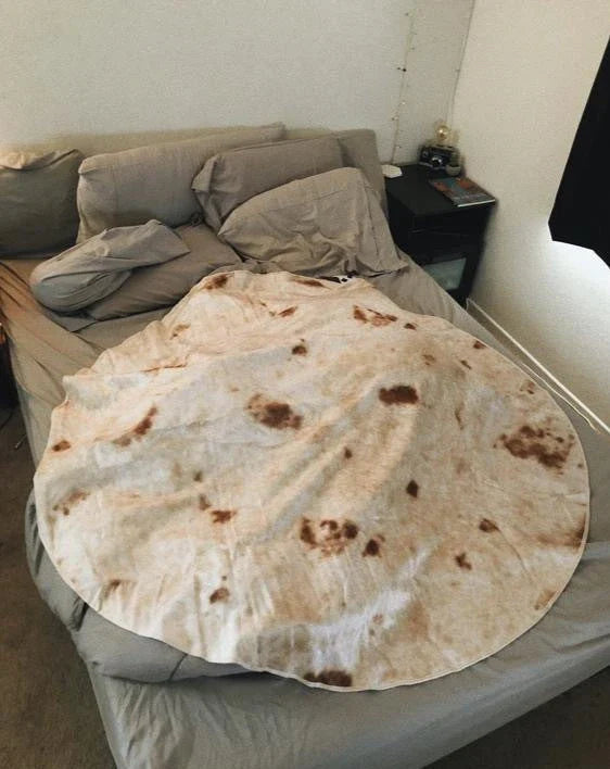 Cozy, soft, and versatile flannel burrito blanket in a unique round shape with a playful, delicious-looking design