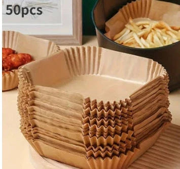 Disposable air fryer liners made of durable, food-grade parchment paper for effortless cleanup and healthy cooking