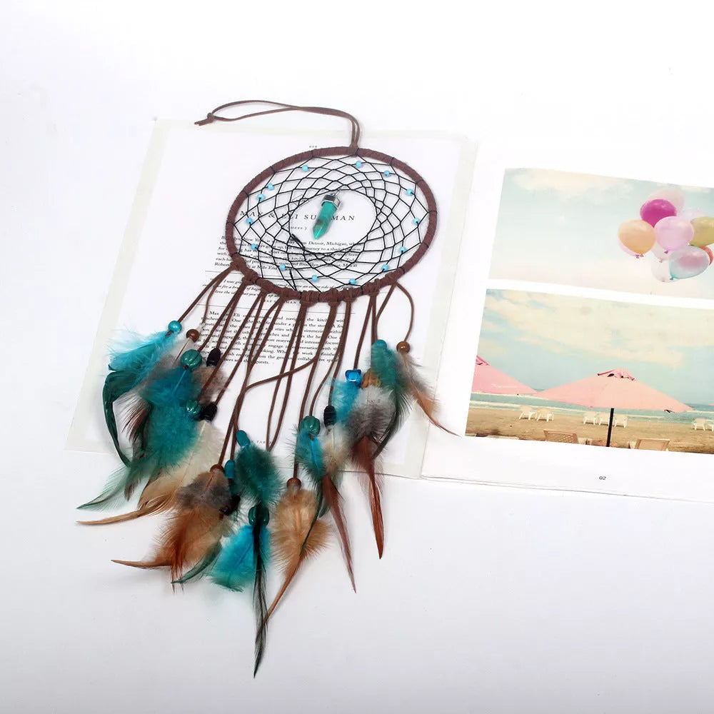 Handmade turquoise dream catcher with feathers and iron ring