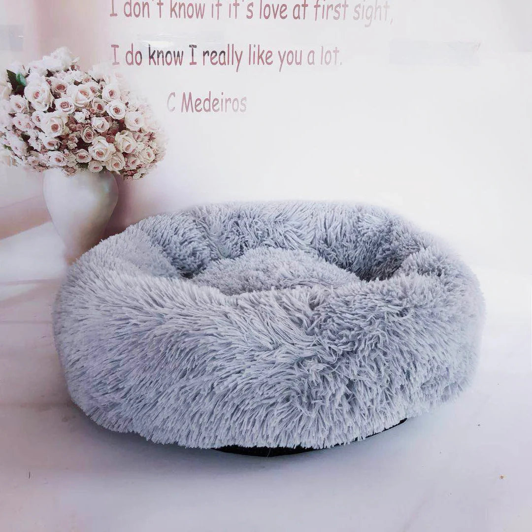 Cozy plush pet nest in various colors and sizes for ultimate pet comfort