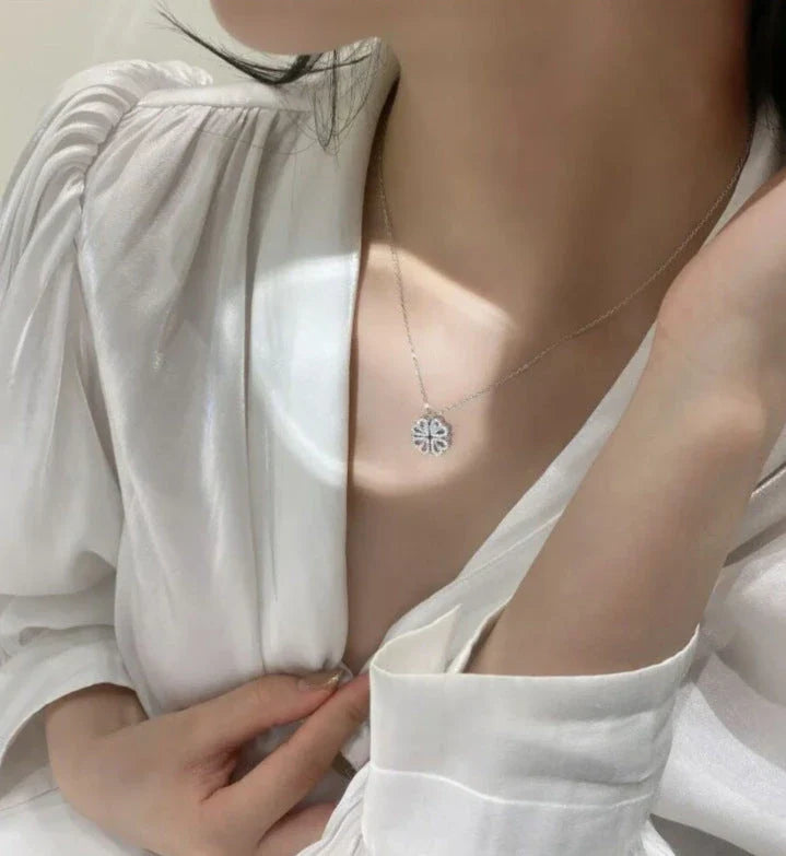Enchanting magnetic heart-shaped four-leaf clover pendant necklace in gold, silver, and rose gold colors