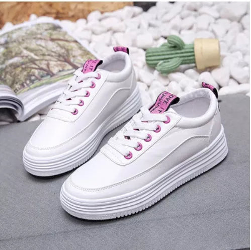 Breathable women's sneakers in black, green, and pink with rubber outsole