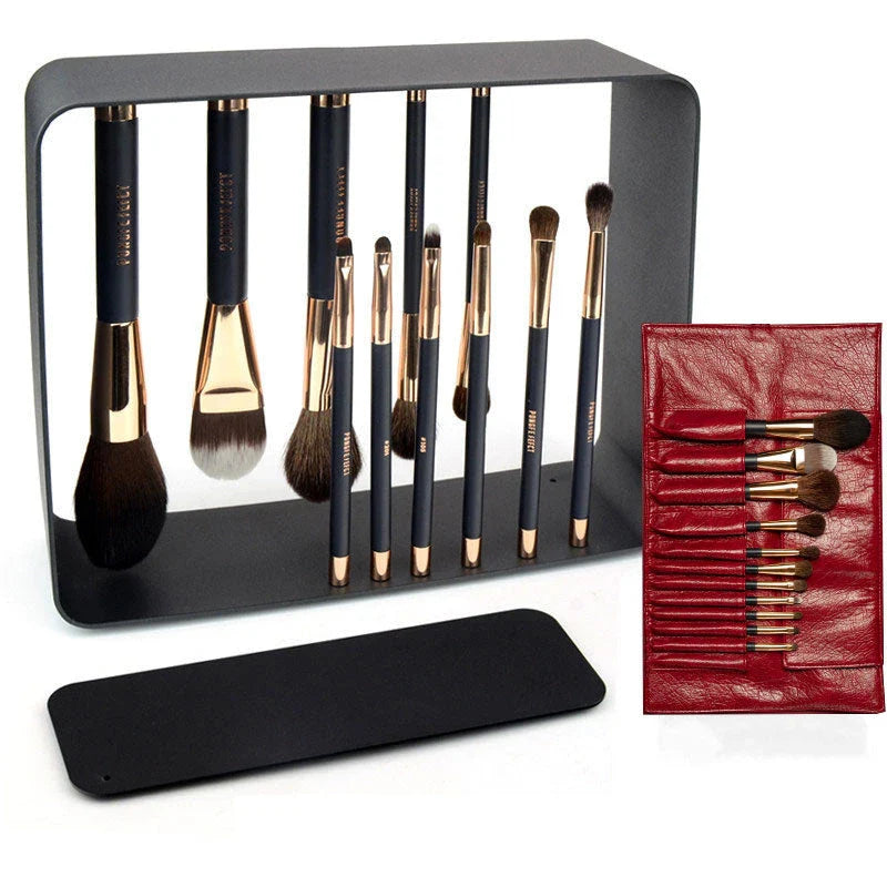 A premium makeup brush set with a sleek black and gold design, featuring 11 essential brushes and a magnetic holder for easy organization.