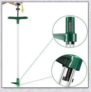 A standing weed puller tool with a long handle and 3-pronged head, designed to easily remove weeds from the root.