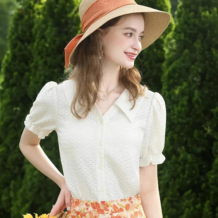 Elegant apricot-colored blouse with French lace details, puff short sleeves, and a V-neck collar