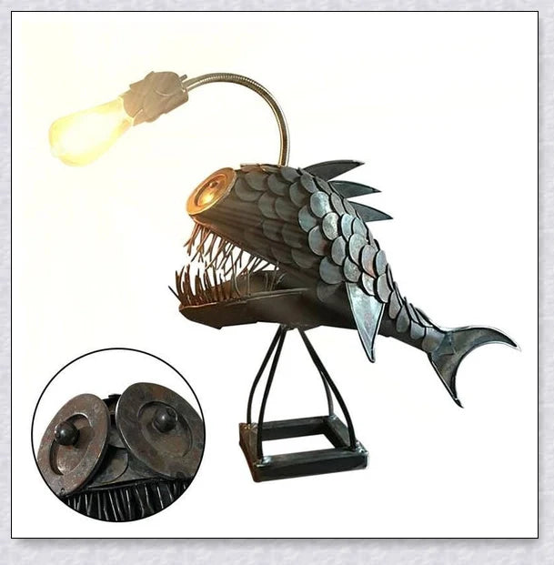 Steampunk angler fish-shaped lamp with rustic iron art tube design and warm, ambient lighting