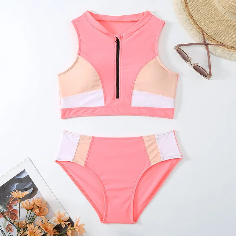 Pink high-waist split bikini swimsuit with briefs style and sleeveless design on mannequin