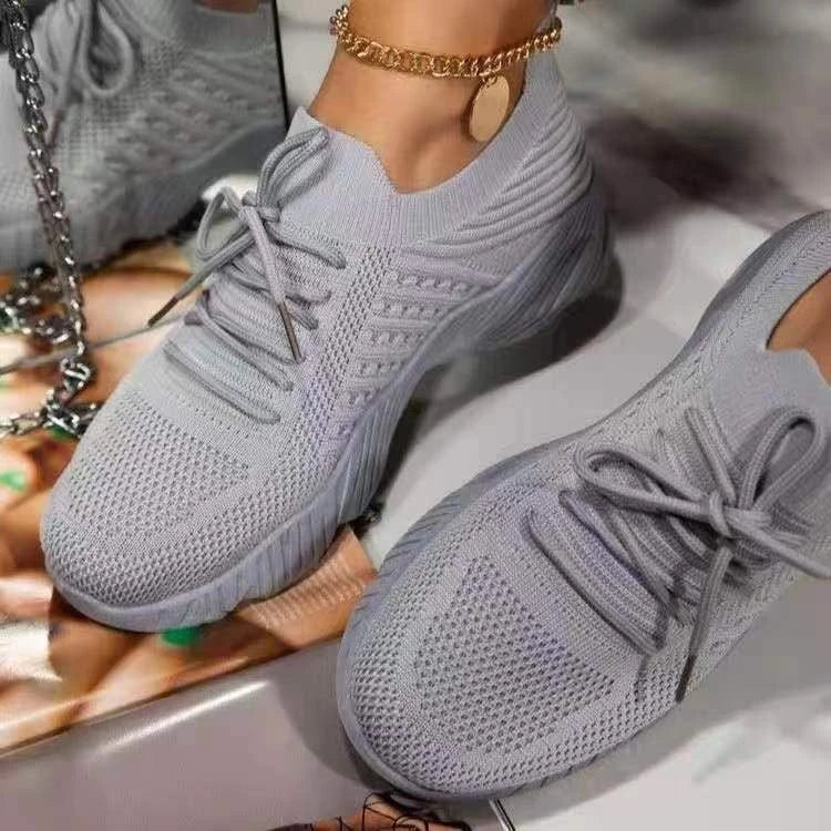 Stylish knit sneakers in various colors for active women, featuring a lightweight, breathable, and comfortable design.