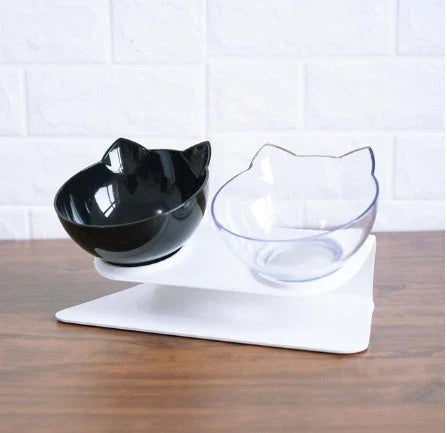 An inclined cat food bowl with a transparent design and a sturdy base, providing a comfortable and hygienic dining experience for your feline friend.