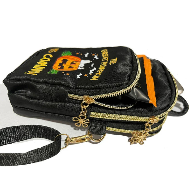 Adorable pumpkin-themed mini crossbody bag in black, featuring a water-resistant nylon construction and hands-free design for everyday use and Halloween festivities