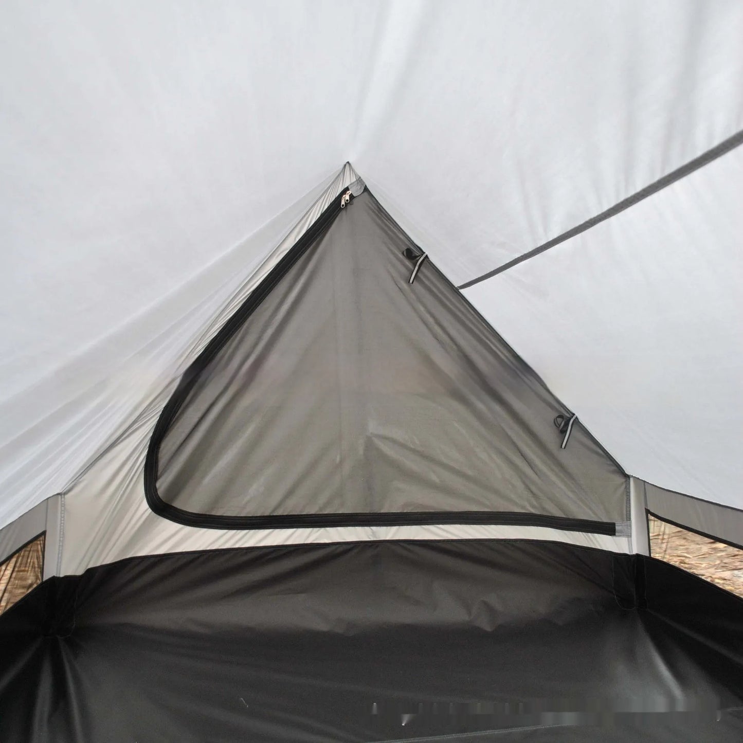 Brown and white portable A-line camping tent set up with hiking poles, showing its spacious interior for 2-3 people.