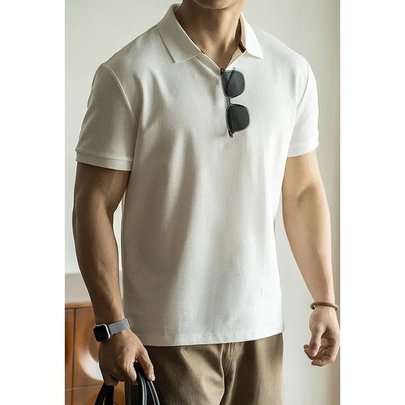 Light blue cotton polyester short-sleeved polo shirt on a hanger.