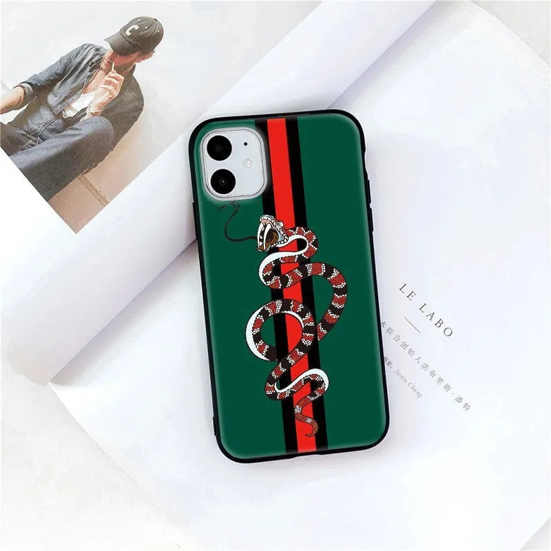 Black frosted silicone iPhone case with a UV-printed cartoon snake design on the back.